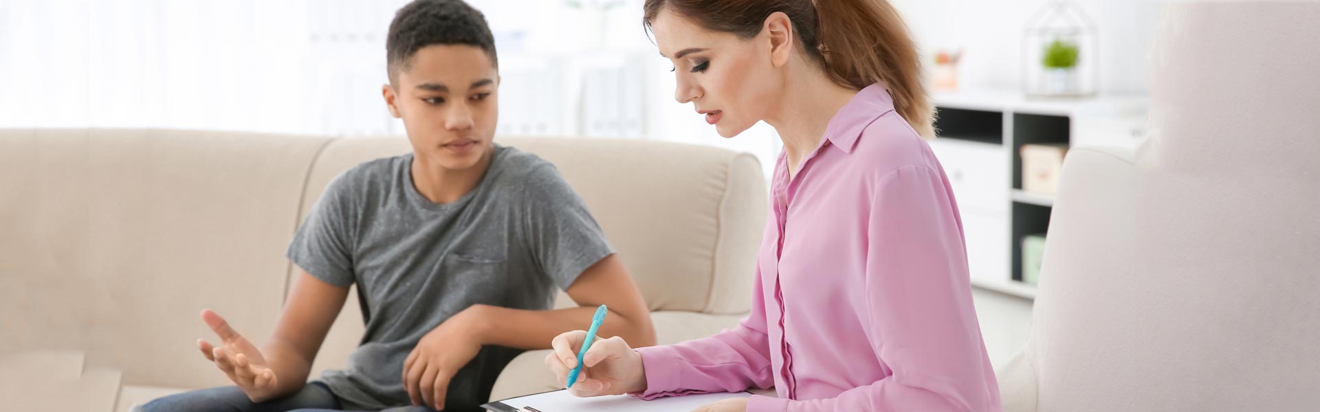 A Boy Talking to a Counselor